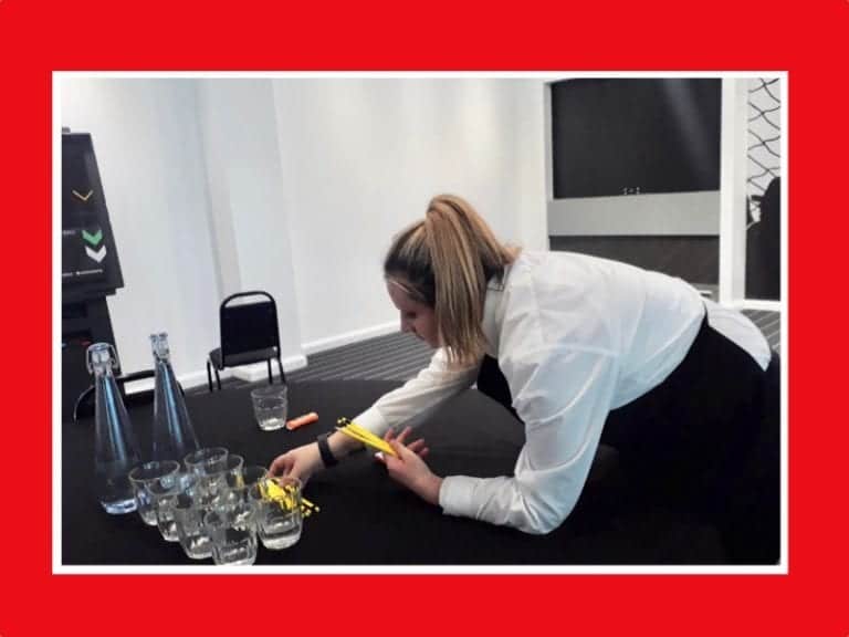 Intern Bobbie lays out stationery at Hotel Football.