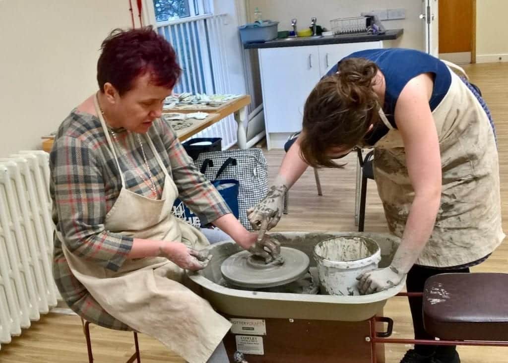 A Pure Art Studio artist tries her hand at pot throwing with Laura Negus of Creative Share