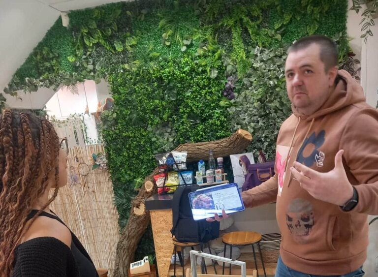 Stephen speaking to customer in shop